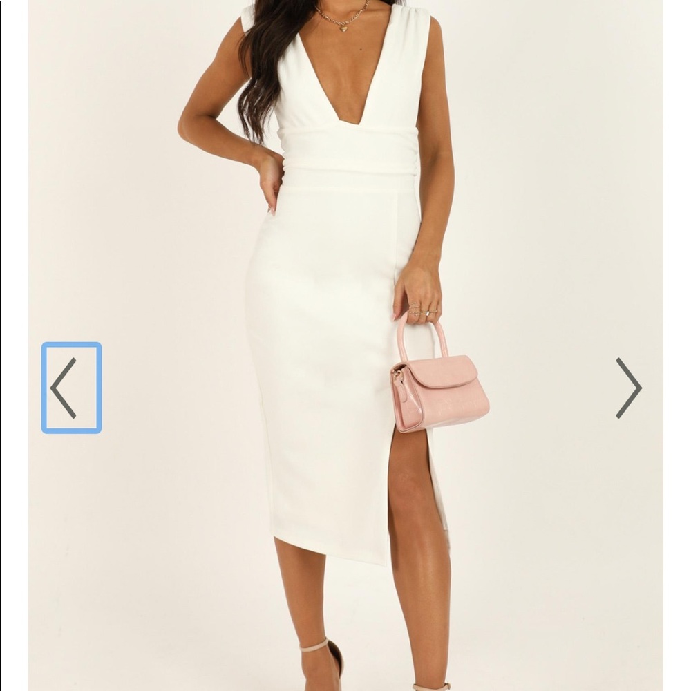 Showpo.  “don’t catch feelings” white cocktail dress.